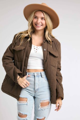 brown puffy quilted style button up jacket.  With 2 chest pockets and side hand pockets too