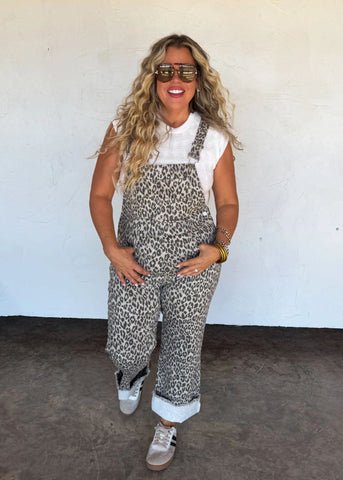 Leopard bib- overalls that are made of stretch fabric